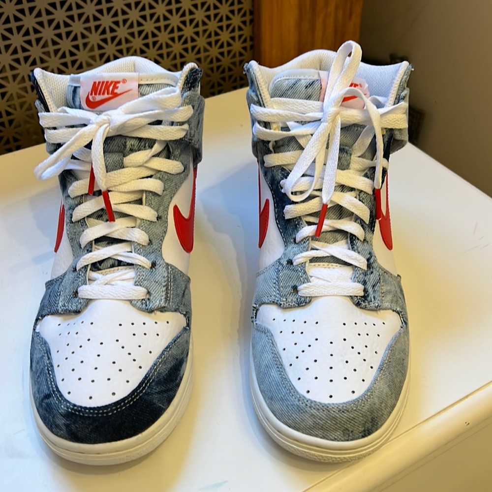 Women’s Nike Dunk High in washed denim. 8.5